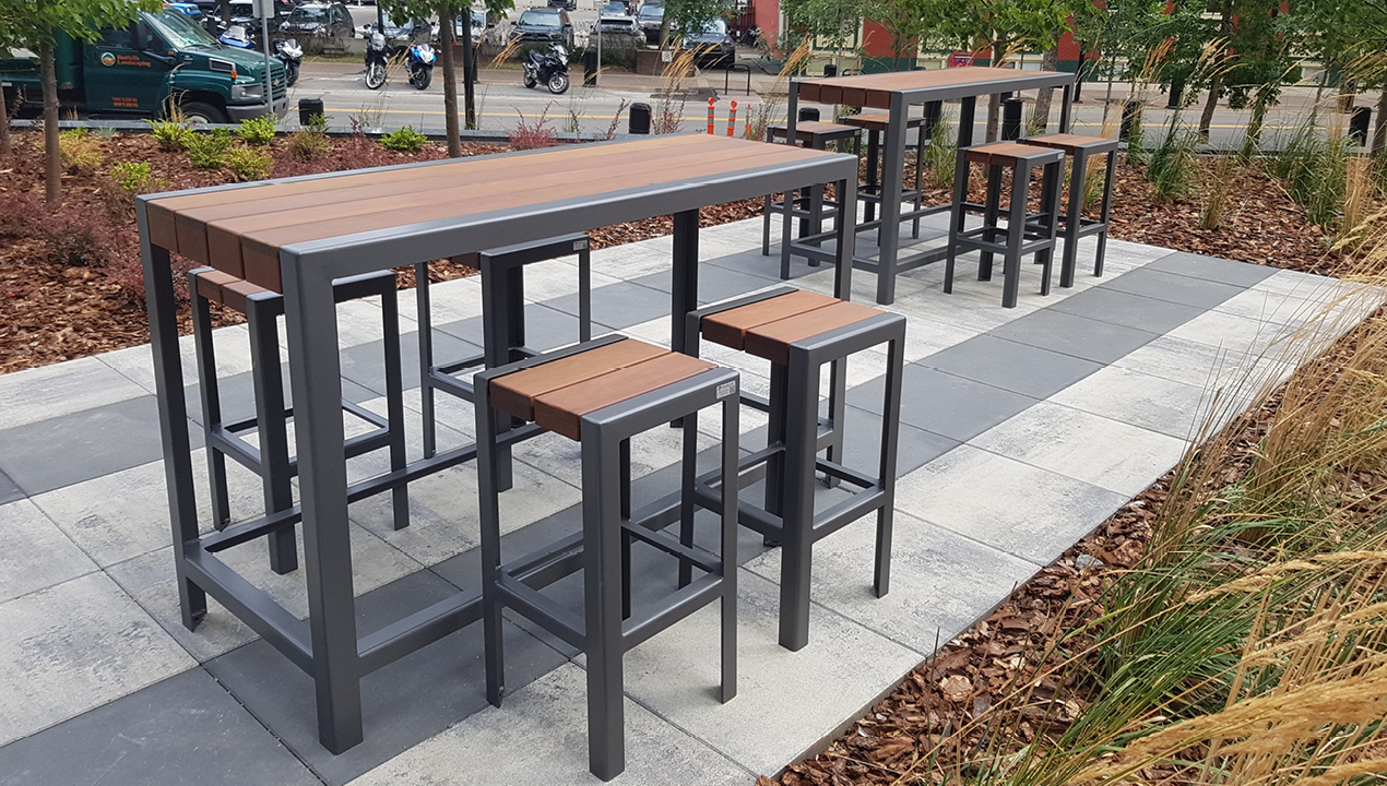Bar height 1050 tables and backless stools