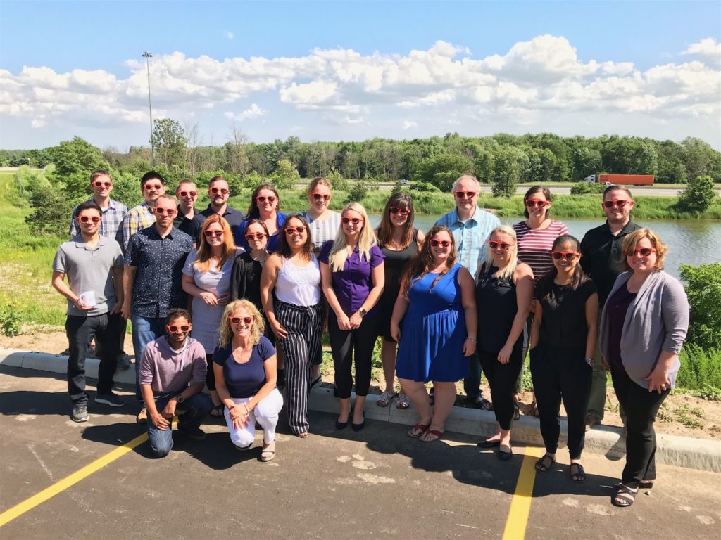 Maglin Staff wearing Orange Sunglasses