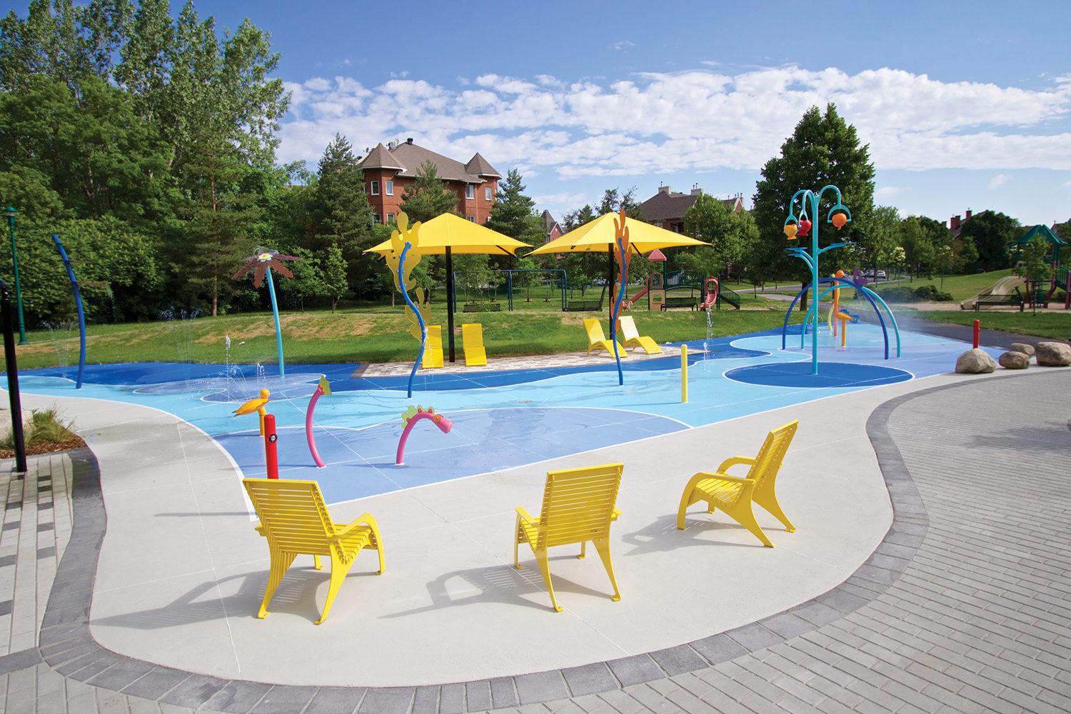 720-Chairs_Cyril-W-McDonald-Park_Montreal Bright Yellow 720 Chairs surround splash pad