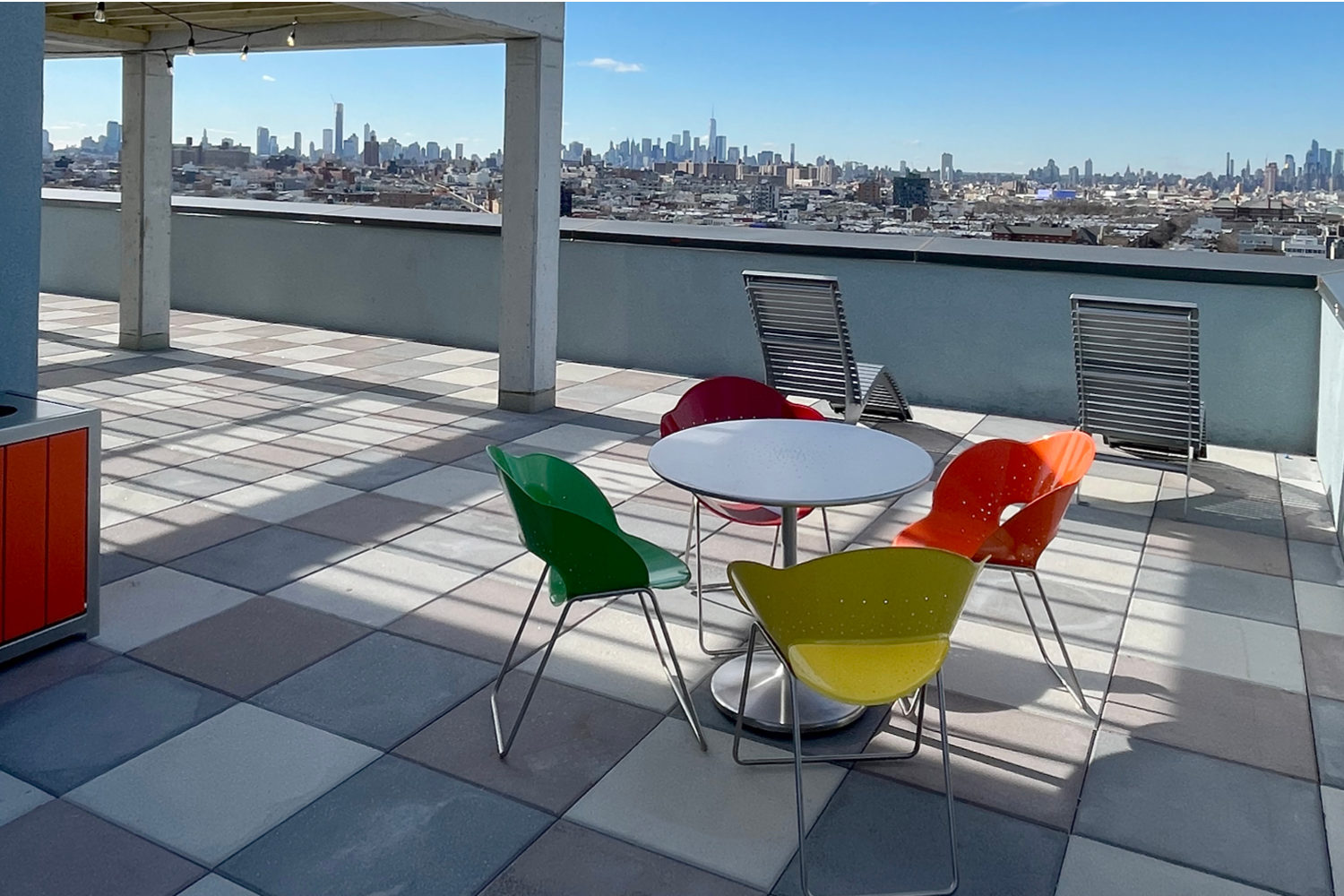 Battery-table-chairs_1510-gates Battery Table and Chairs brightly painted on roof-top