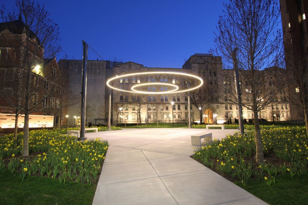 Crerar Quad at University of Chicago Crerar Quad circle of light suspending in the sky at night