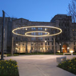 Crerar Quad Circle of Light suspended by four posts at the University of Chicago