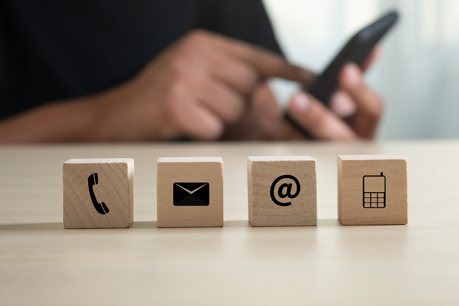 Wooden blocks with phone, email, cell for contacting Maglin