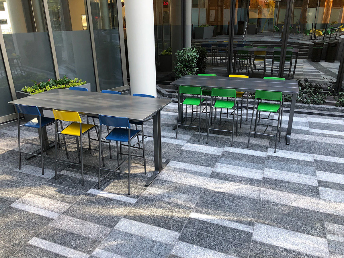 Foro bar height stools powdercoated green, yellow and blue with ancora table