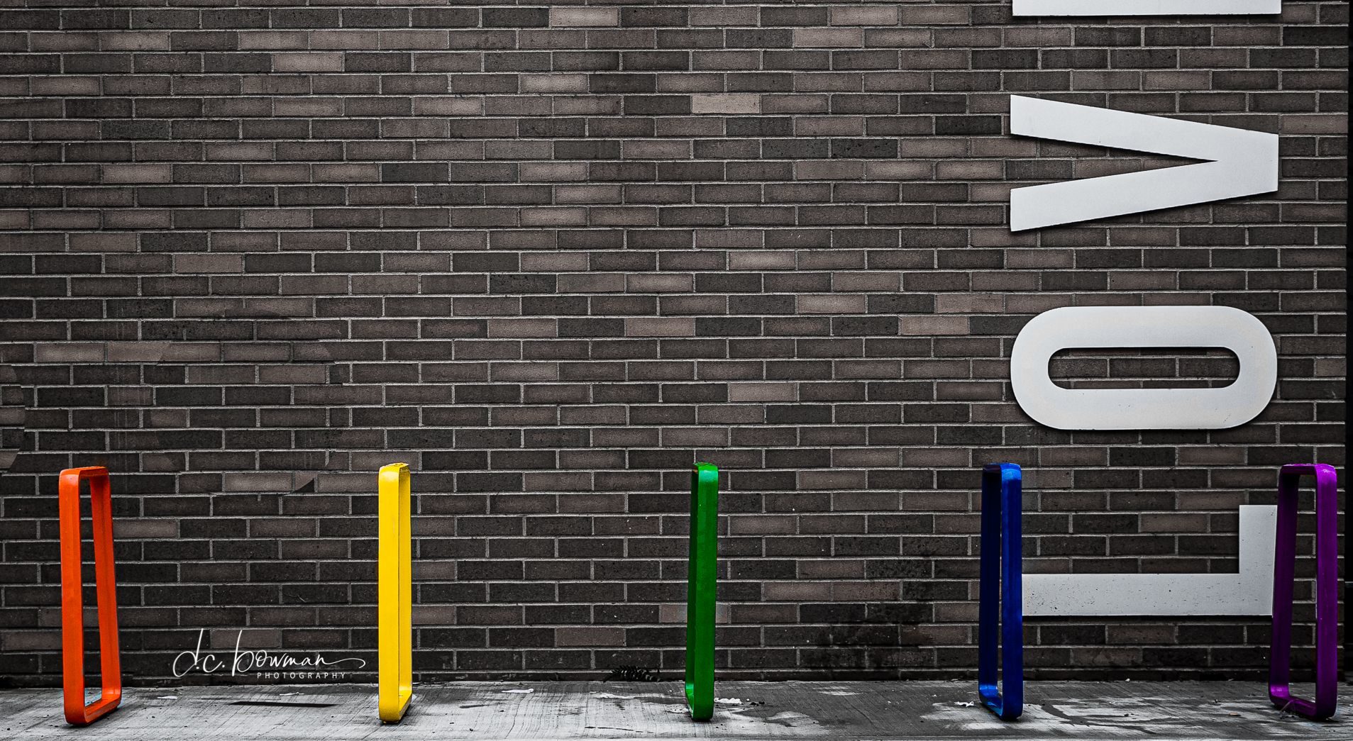 Iconic Bike Racks Brightly painted Iconic Bike Racks in front of LOVE wall