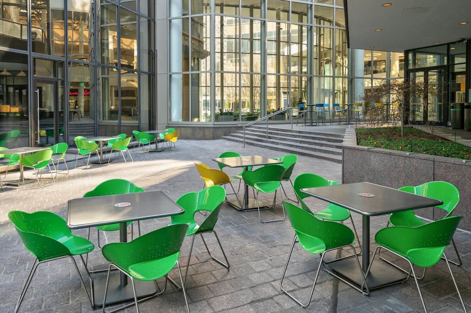 HOME_INSTALLATIONS_TABLES & SEATING_Bank of America_Foro Table & Battery Chair Green chairs and silver tables