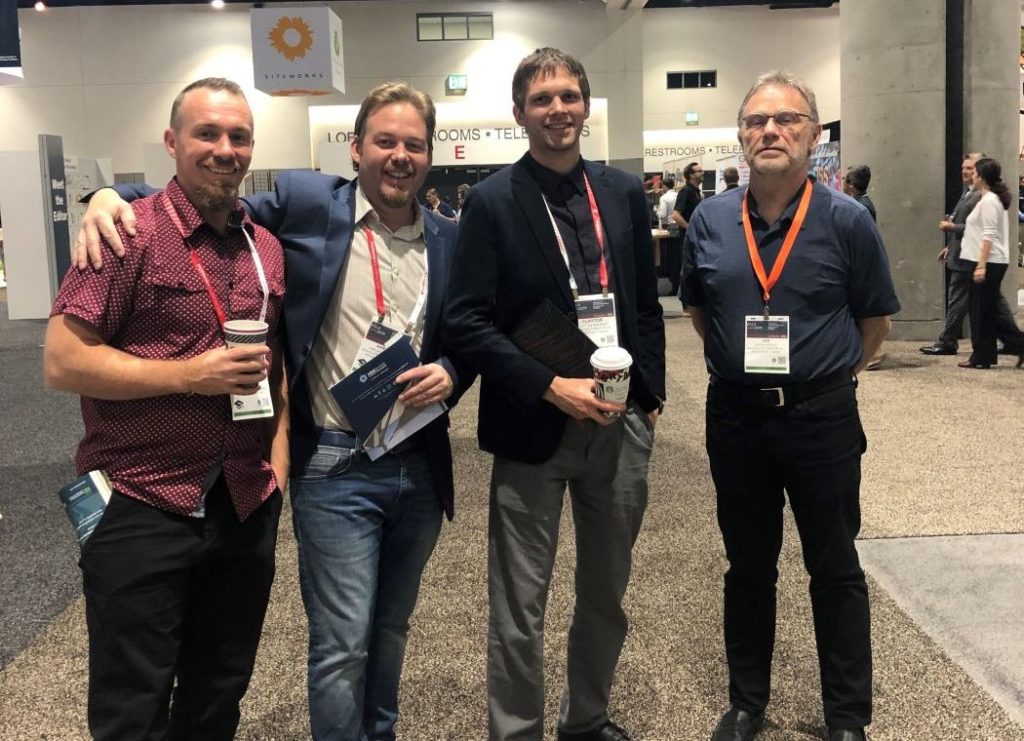 Jaime Aaron Clayton and Ian at Tradeshow