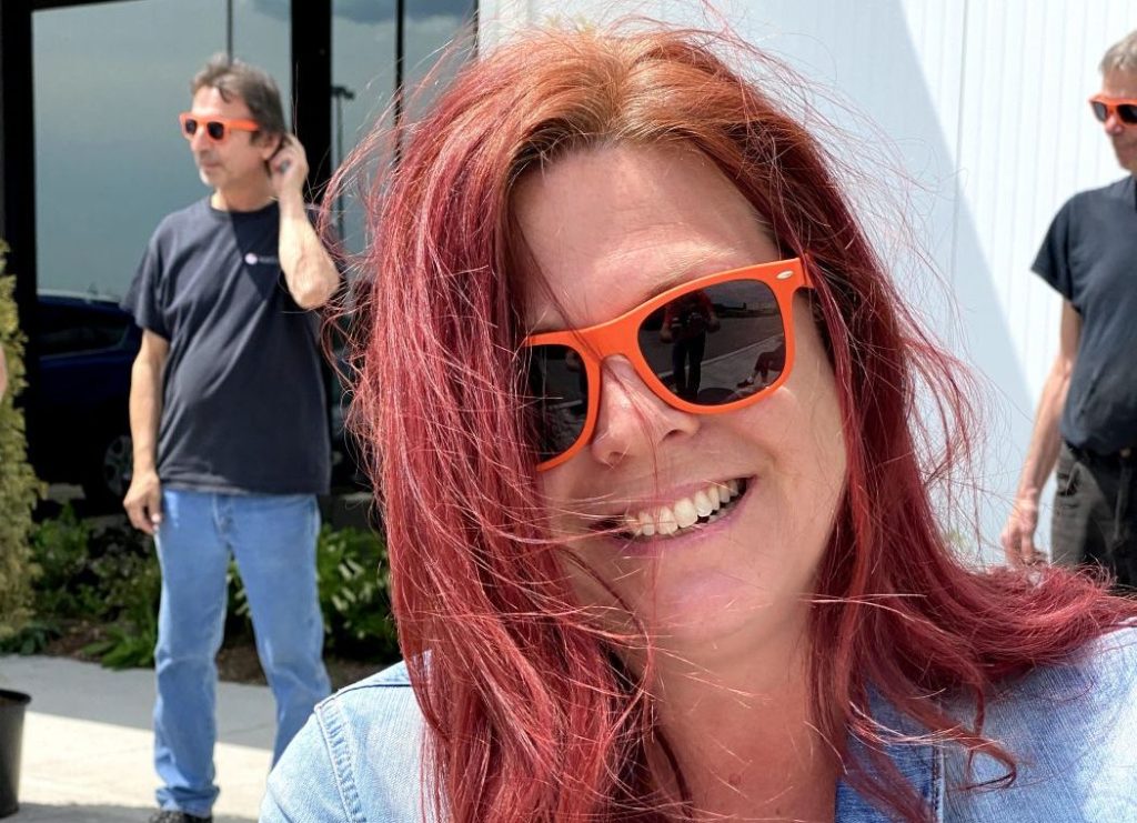 Kelly in Orange Sunglasses