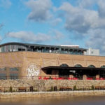 Kingsley Town Center with benches and water