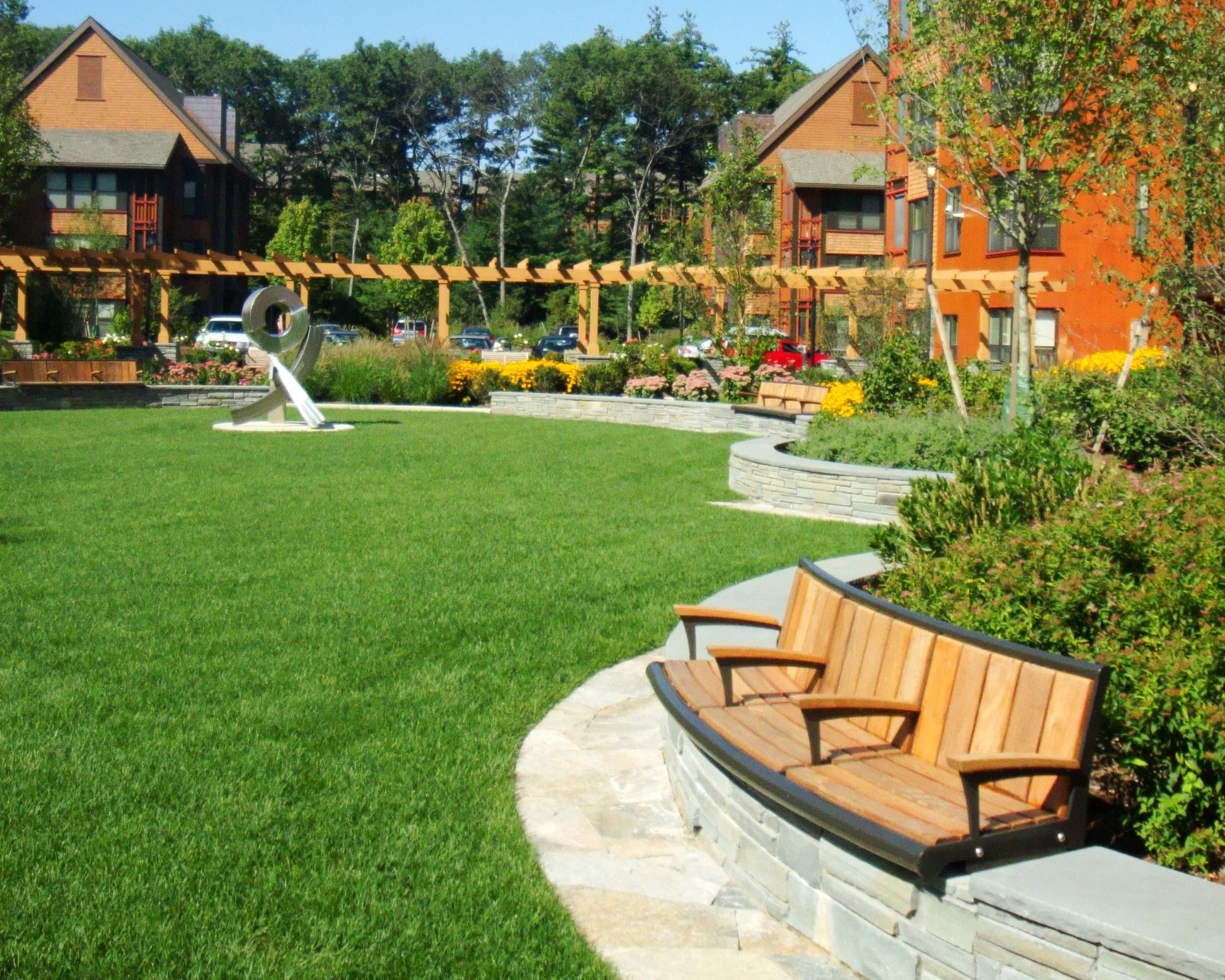 Backed Curved Bench near Houses