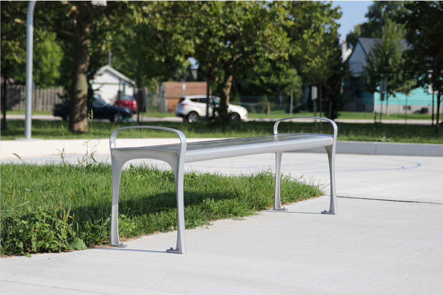 MBE-0870-Backless-bench_east-lions-park 870 Backless Metal Bench in park setting