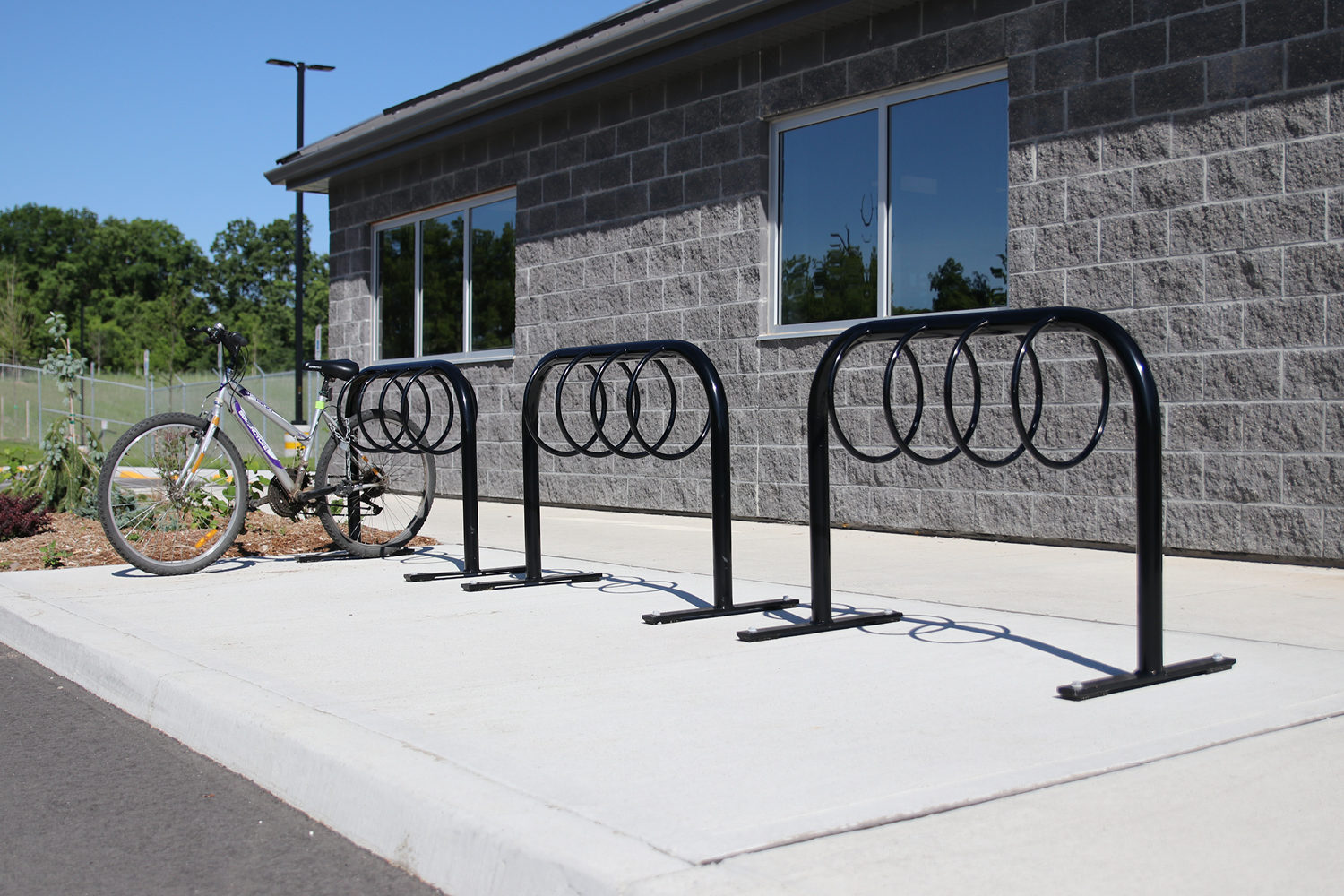 MBR-0300-Bike-Racks_Hershey-Factory MBR-0300 Bike Racks with bike in front of building