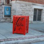 Metal Red Bench with Design Cut into it