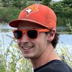 Owen-Headshot Headshot of Owen with sunglasses and blue jays hat
