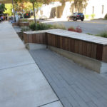 Custom wood bench at Stonewall Station in Charlotte