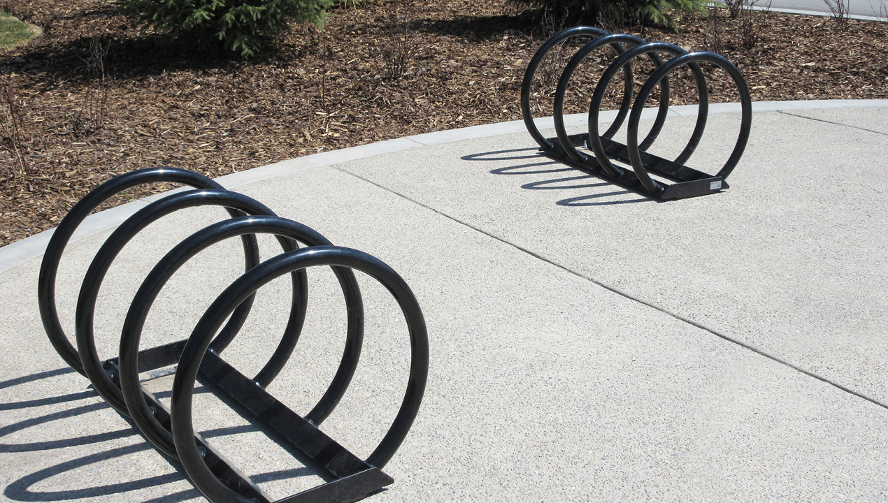 Two Black Bike Racks with four loops for attachment on each rack