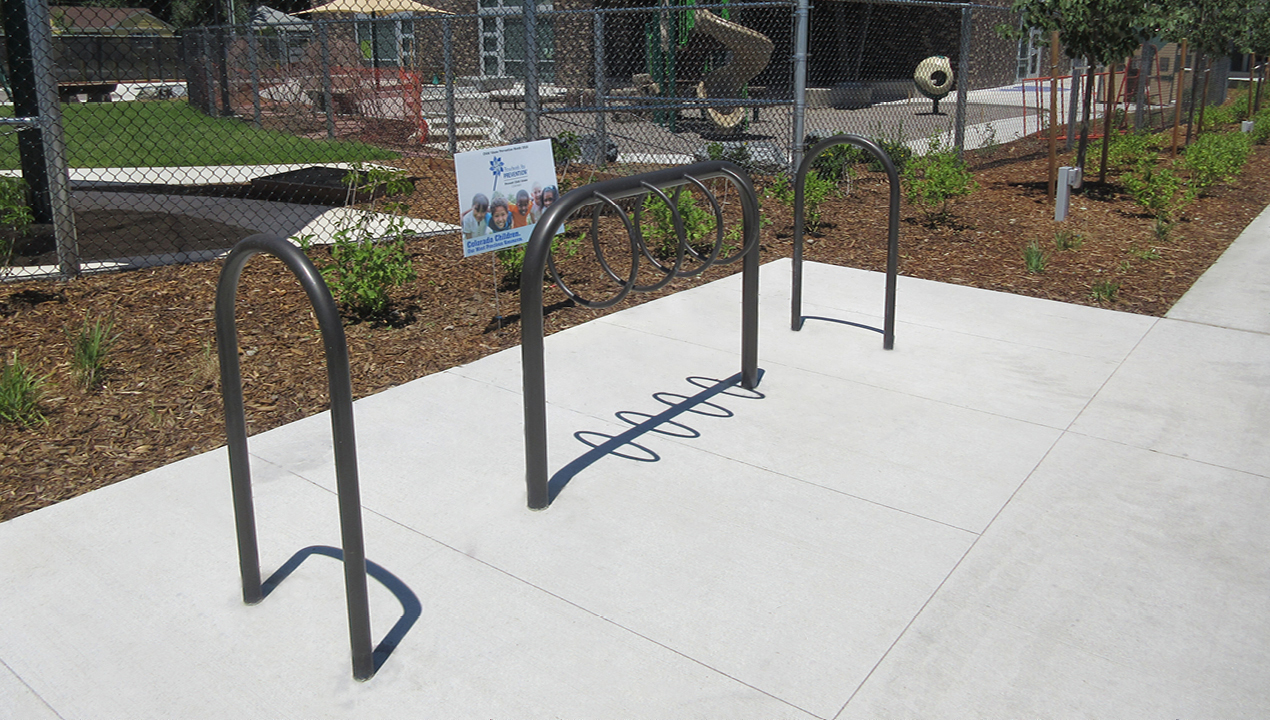 500 Series and 300 Series Bike Racks, direct burial with park in background