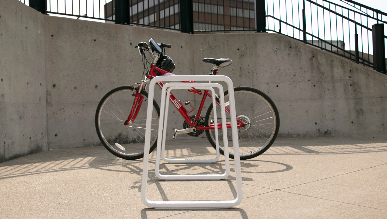 White Bike Rack with Red Bike