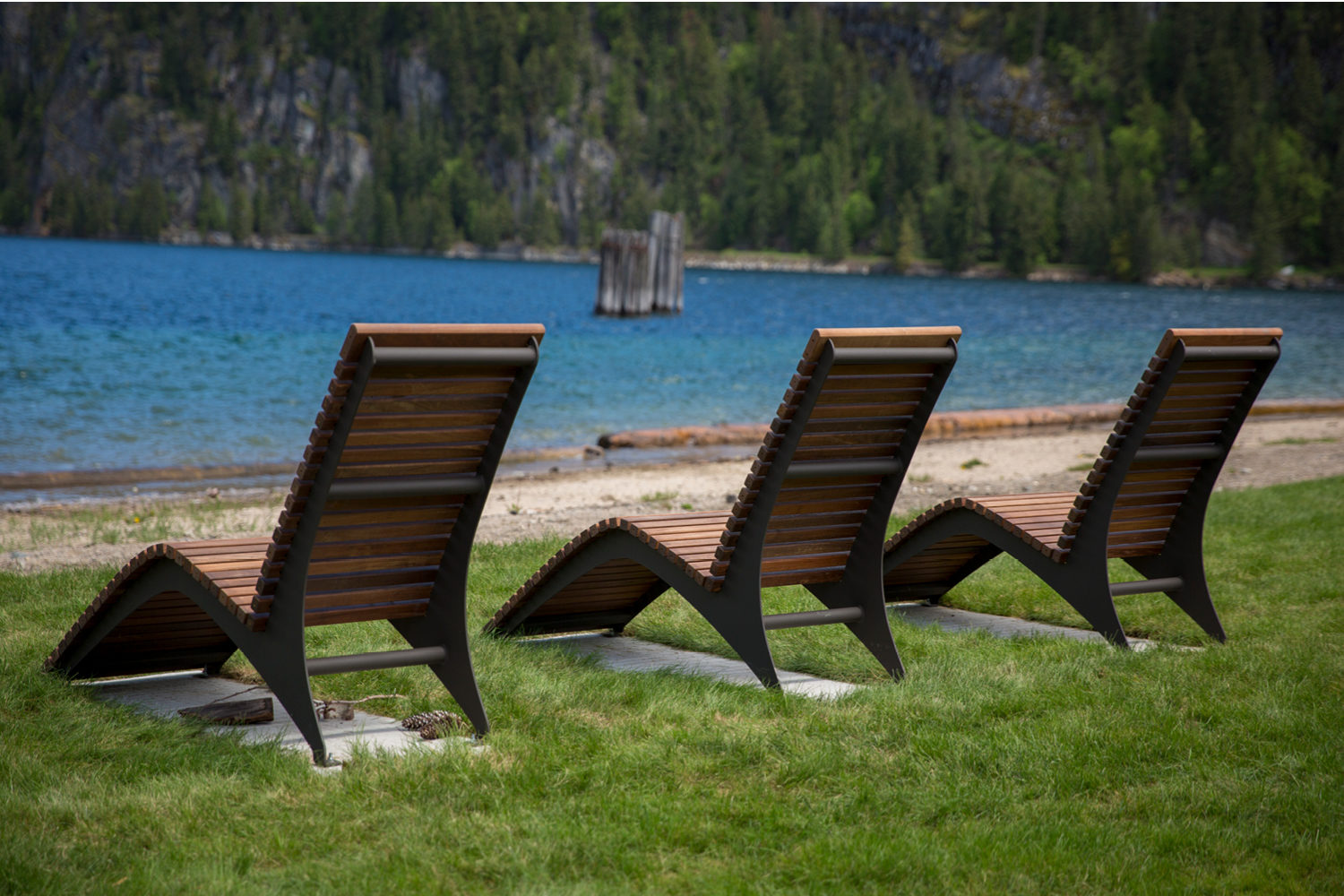 720 Lounge chairs in Ipe Wood in front of body of water