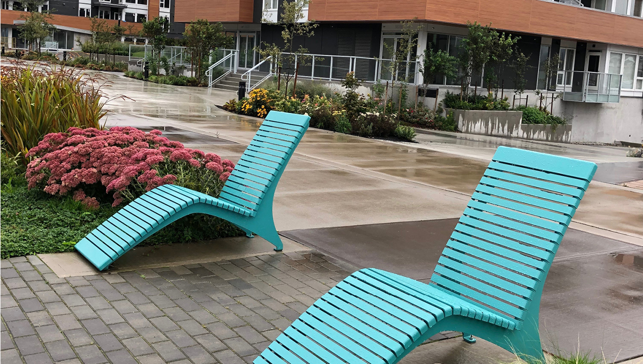 Blue Lounge Chairs Near Building