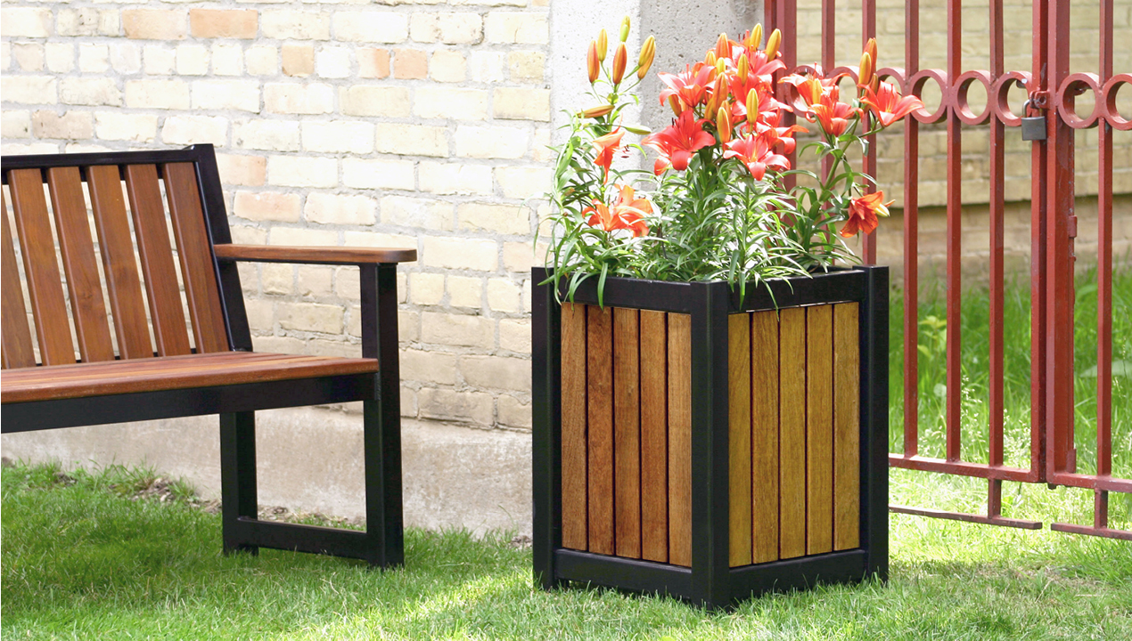 Wood and Black Planter with Orange Flowers