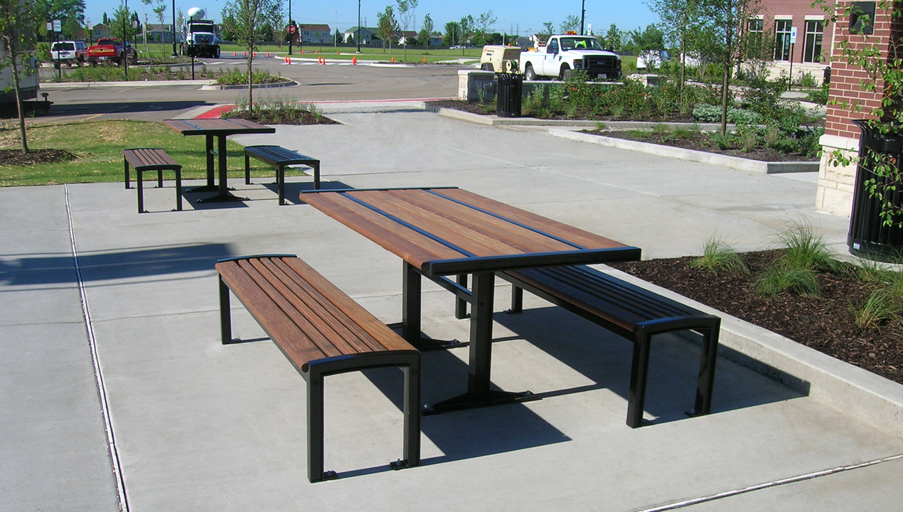 Benches and Table outside Building Near Parking Lot