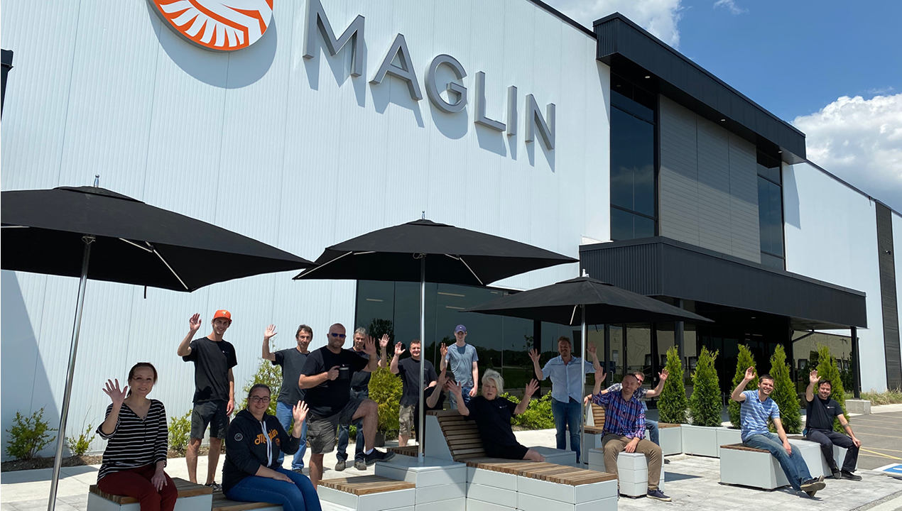 Employees sitting on the patio at Maglin Site Furniture