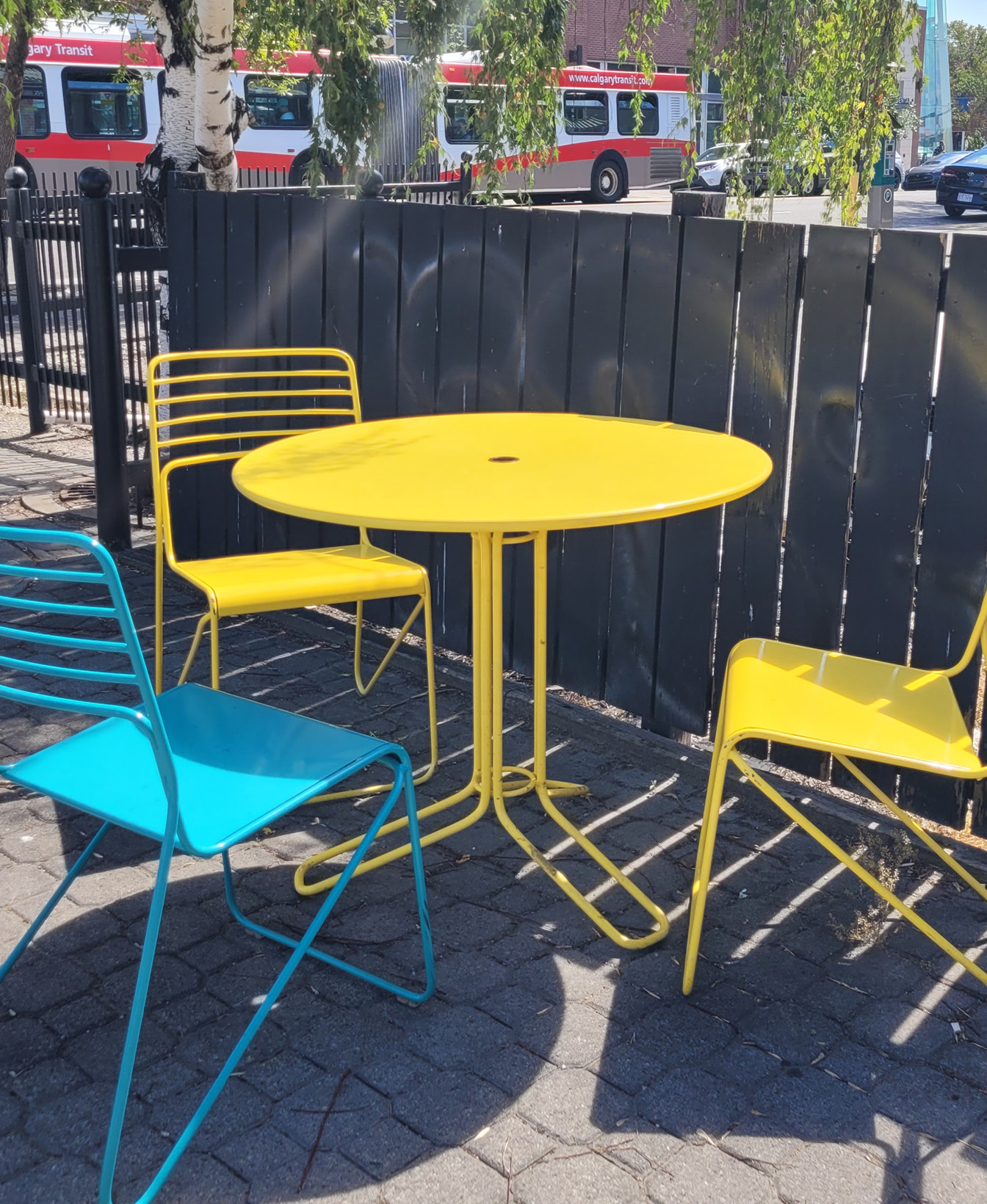 Yellow Kontur table with blue and yellow kontur chairs