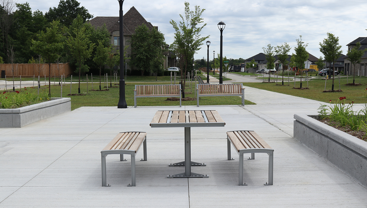 720 cluster seating - table with 2 backless benches in park setting