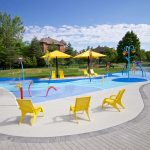 Yellow 720 Chairs surrounding splash pad