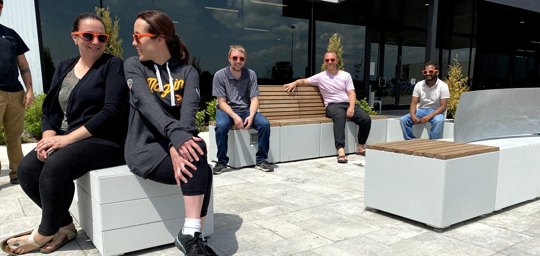 Maglin employees enjoying the sunshine on Pixel Seating