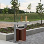 MUG Waste/Recycle Container with Rain Shield and MUG Bike Racks at a park