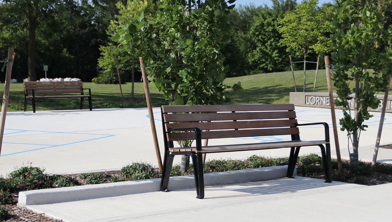 MBE-2300-00017: Iconic Backed Benches with Arms, Ipe Wood Seat and Back in park