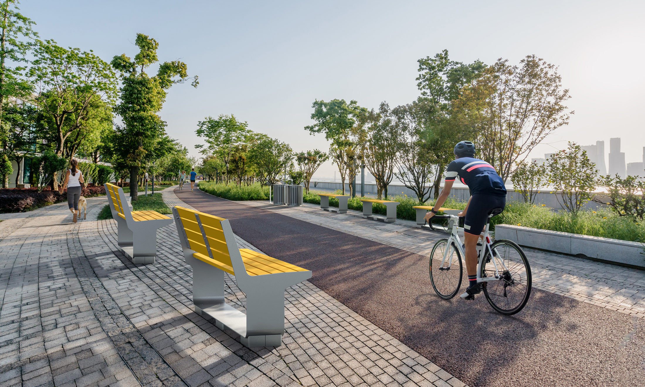 L-Series benches along a walkway with cyclist