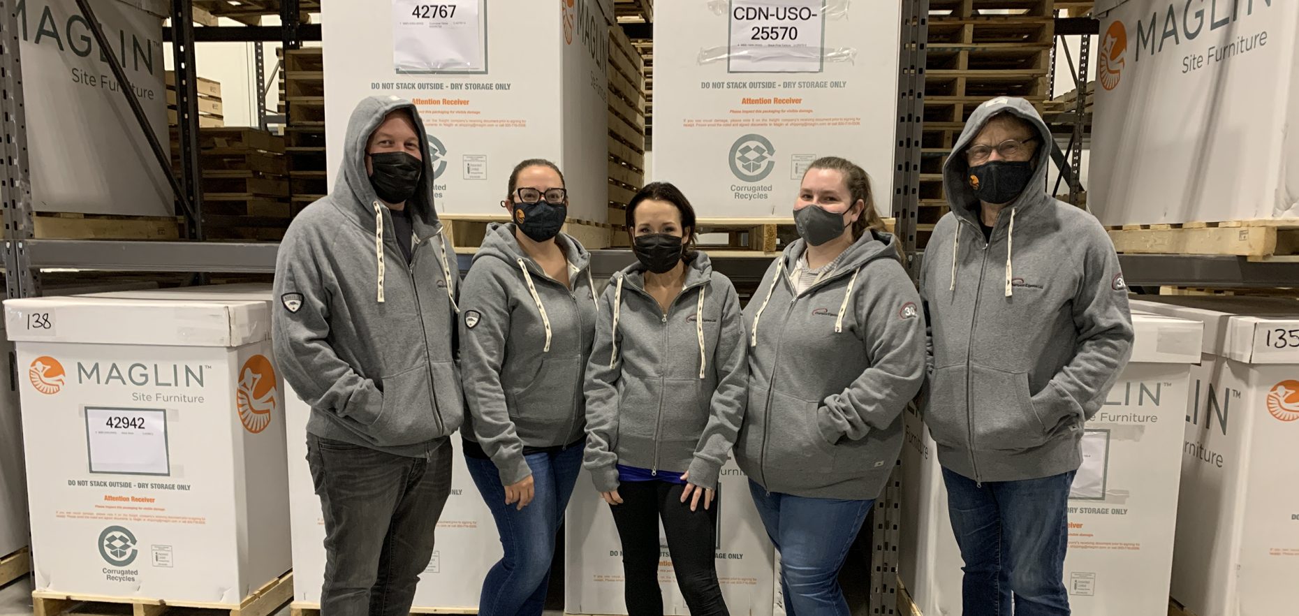 Maglin employees dressed in hoodies at Maglin Site Furniture