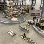 overhead view of battery playscape site amenities in a warehouse