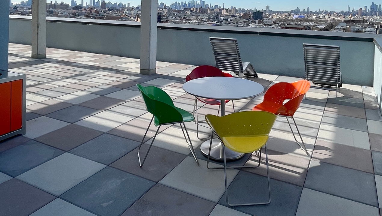 Colorful Battery Chairs with Battery Table on roof top patio