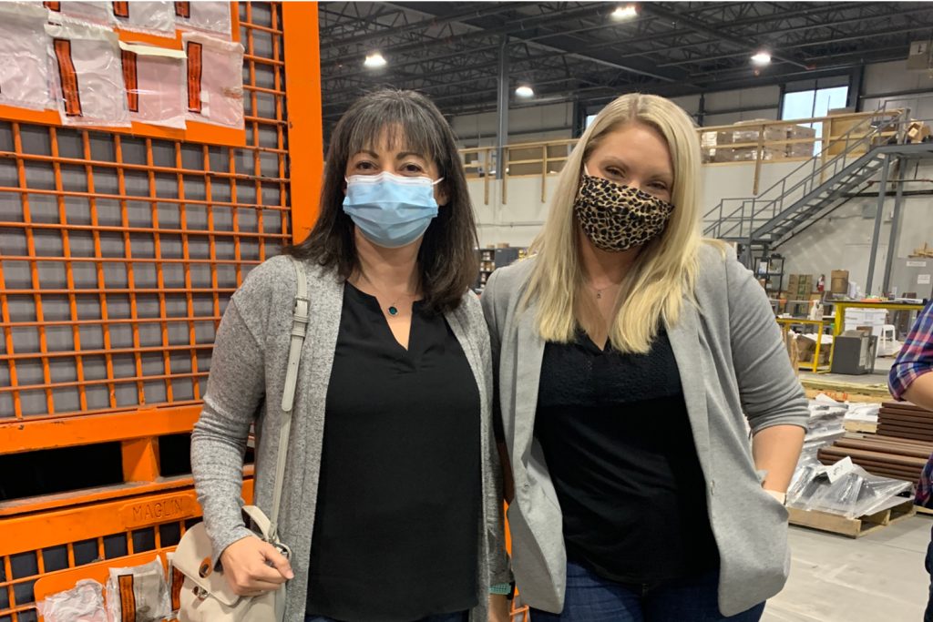 Lynn-Jenny Lynn and Jenny wearing matching tops in the Maglin plant