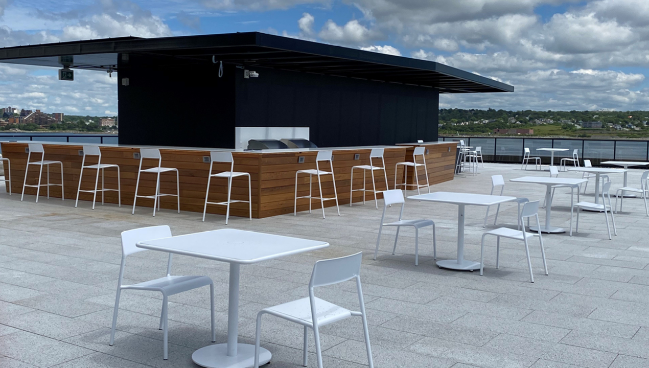 Foro square tables and chairs powdercoated white on roof top patio