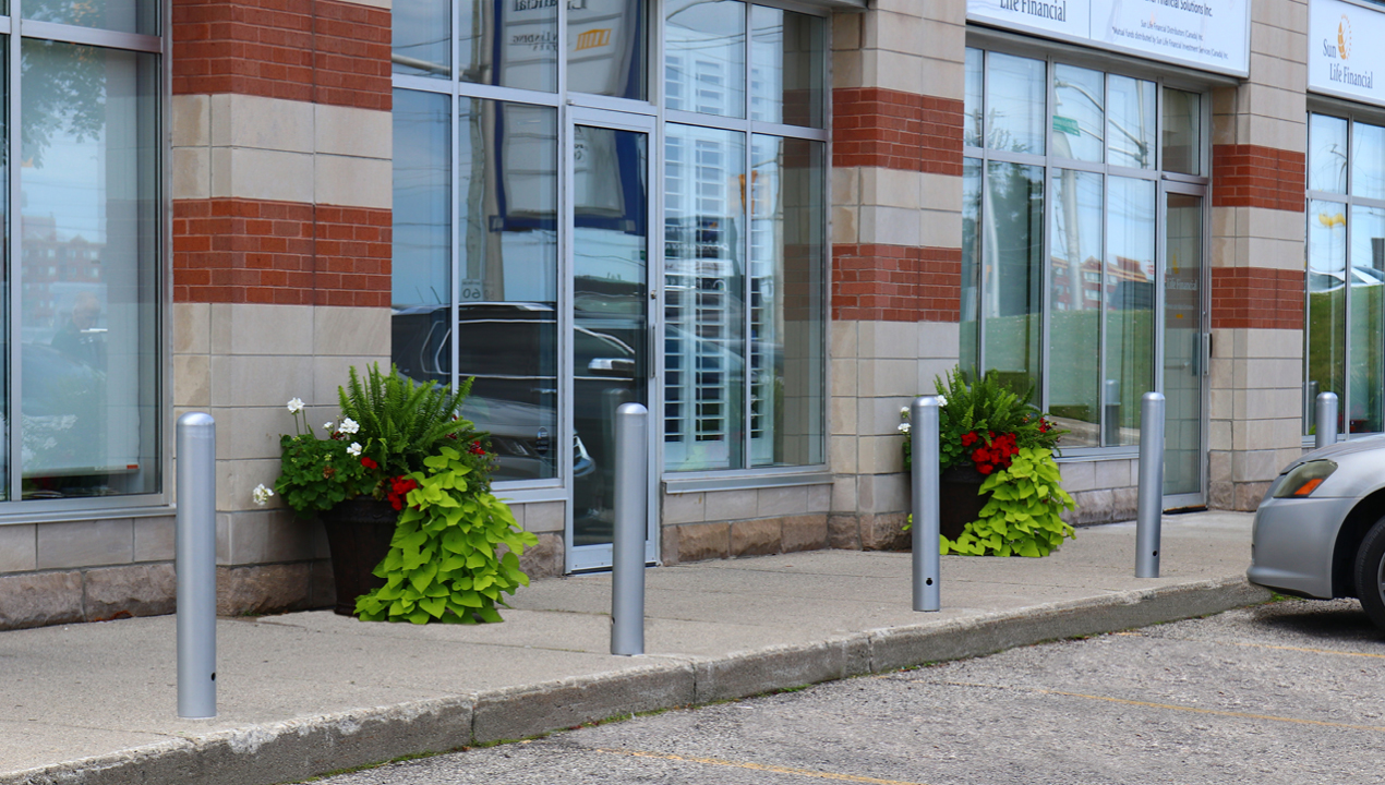 MBO-0500 Series Bollard in front of strip mall