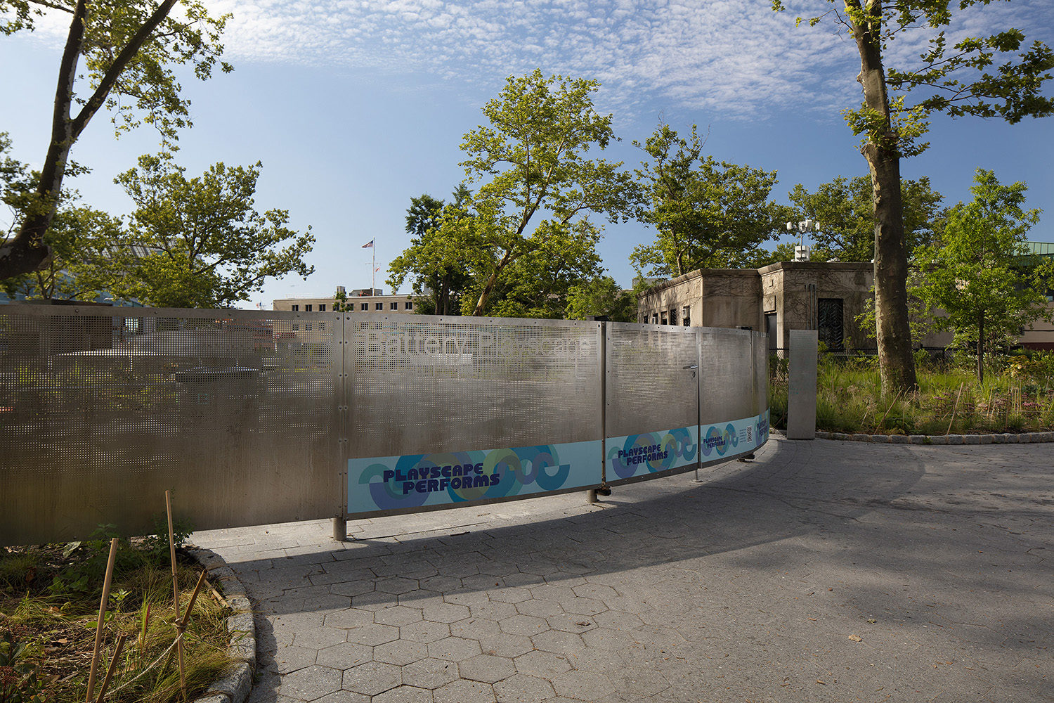 Custom steel perforated panels surround the Battery Playscape in New York