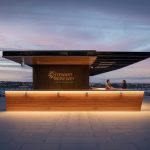 Evening view of the rooftop bar of Stewart McKelvey with Foro tables and seating surrounding