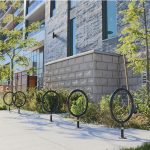 150 Series Bike Racks lined up in front of Metalworks apartment complex