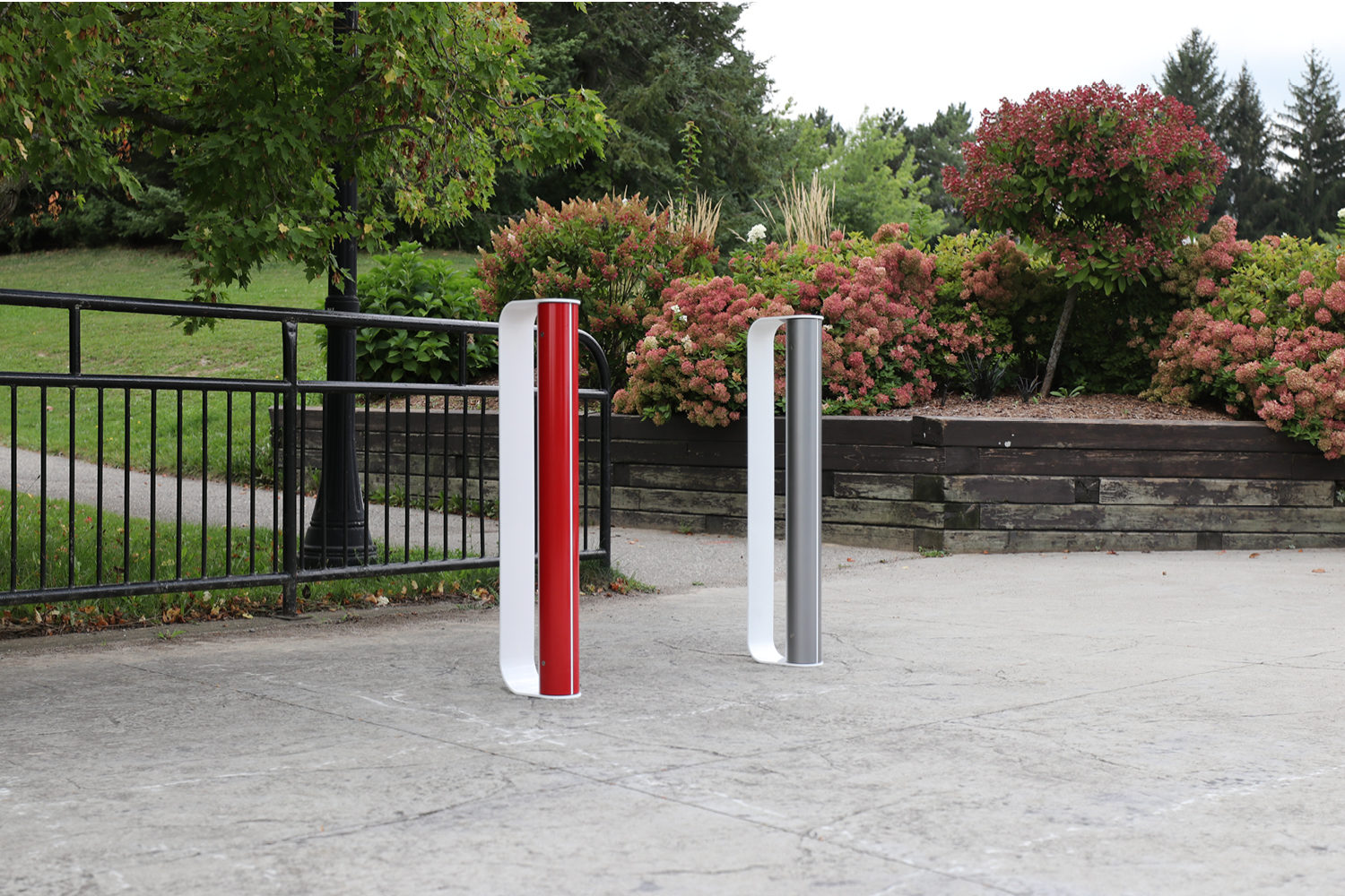 Red, Gunmetal and White MUG Bike Racks with greenery
