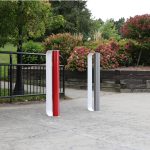 Red, Gunmetal and White MUG Bike Racks with greenery