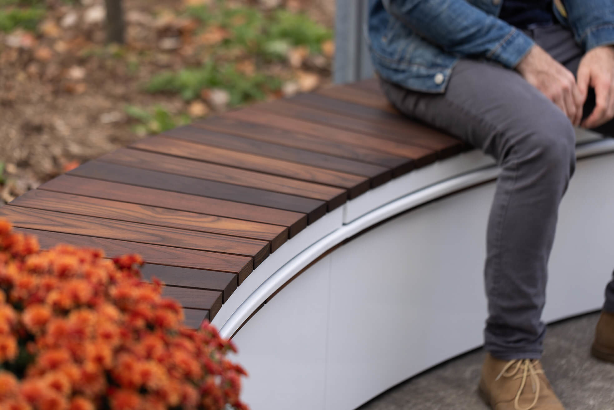 Close up of curved bench and modular planter