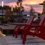 Maglin's 720 Chairs painted red against sunset at Bathurst Quay Commons