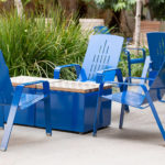 Maglin ALUM Lounge Chairs sit with Pixel coffee tables amongst greenery at CSUSM