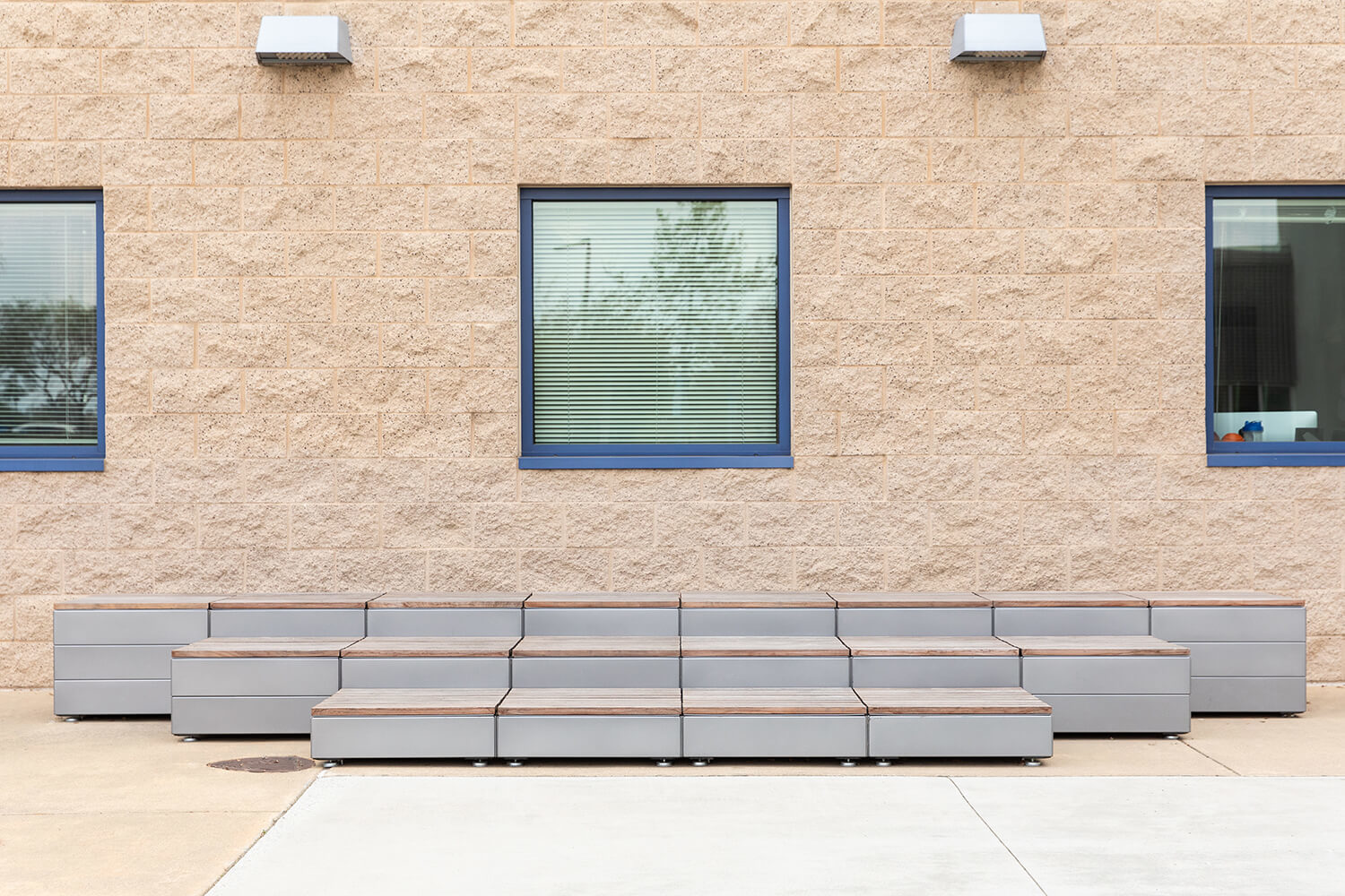 Maglin Pixel layout filled with short blocks stacked against a concrete wall with windows at CSUSM