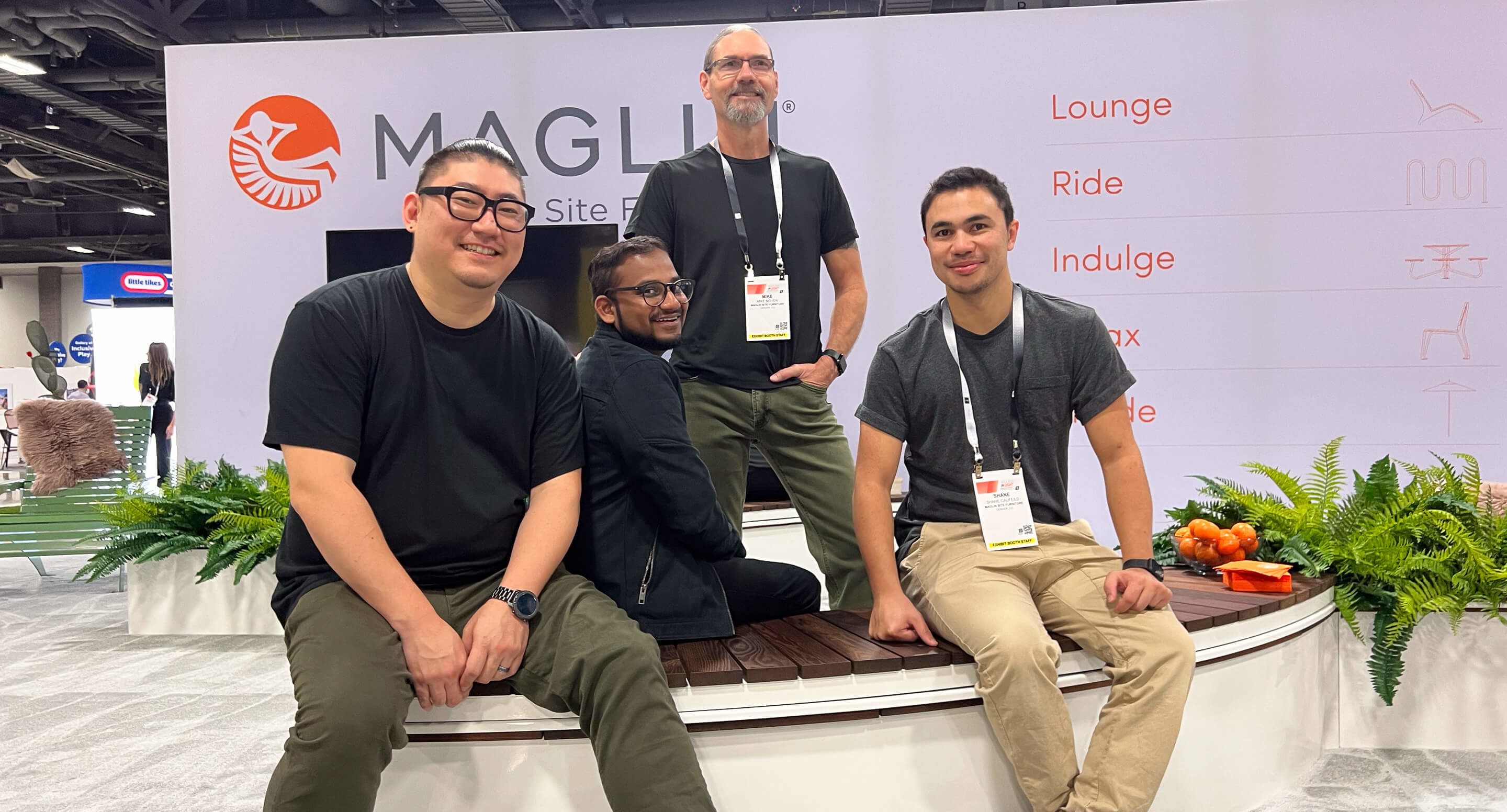Maglin employees Chung, Vidu, Mike and Shane smile for the camera in the Maglin booth at ASLA 2025 in Washington DC.